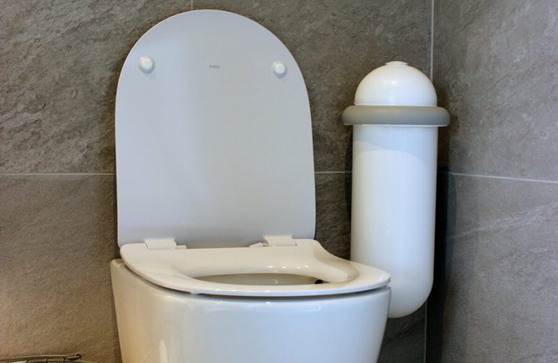 The Pod Classic Mini placed next to a toilet