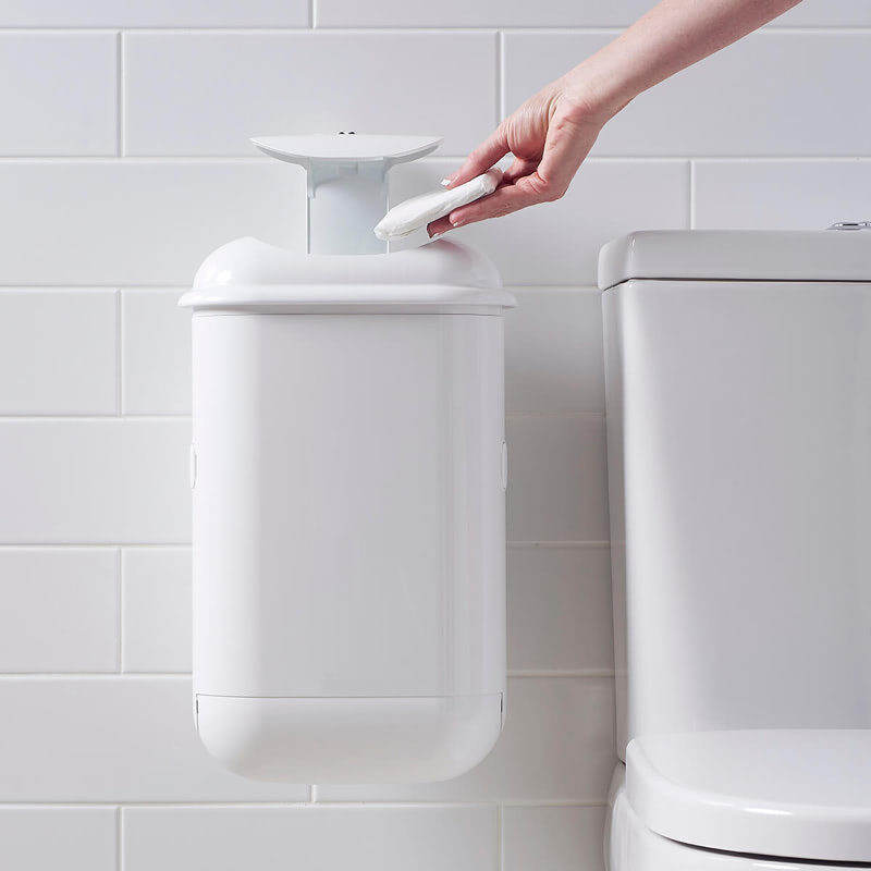 Disposing of sanitary waste in Pod Petite Auto Touch-free hygienic automatic sanitary bin