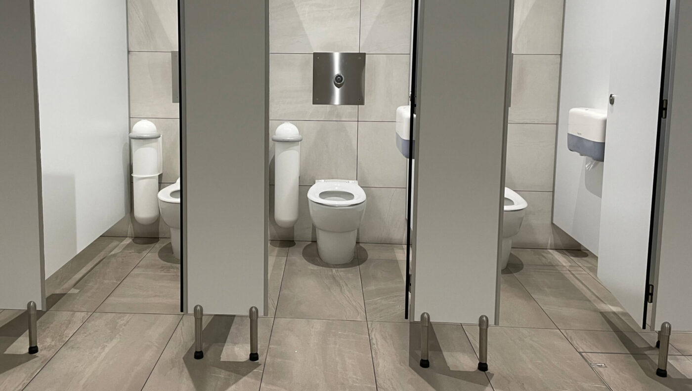 Pod Classic Touch-free White Sanitary Units in Washroom Cubicles