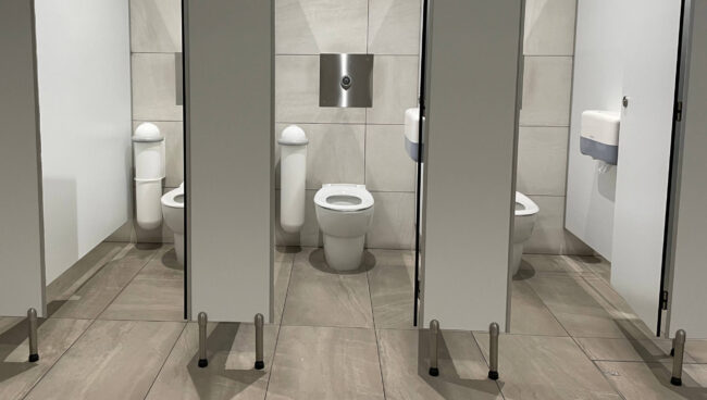 Pod Classic Touch-free White Sanitary Units in Washroom Cubicles