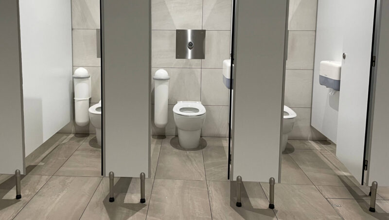 Pod Classic Touch-free White Sanitary Units in Washroom Cubicles