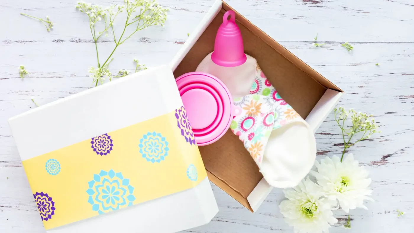 First period kit - gift box containing reusable menstrual cup and pads