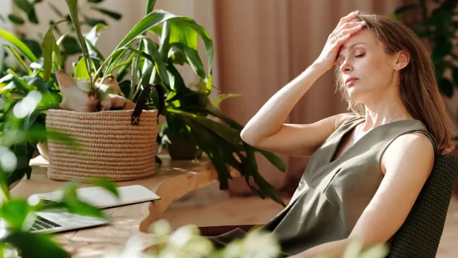 Perimenopause symptoms – woman in discomfort due to physical changes